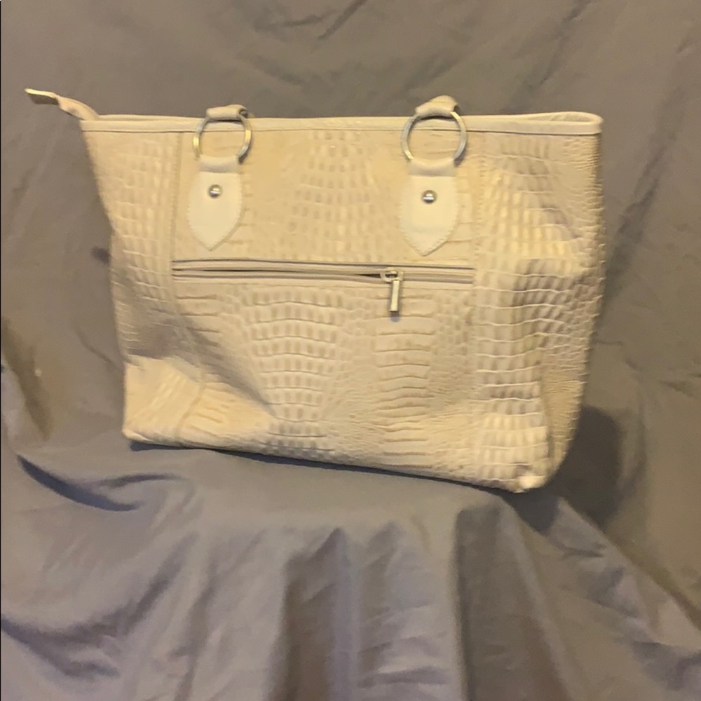 Leather cream colored handbag